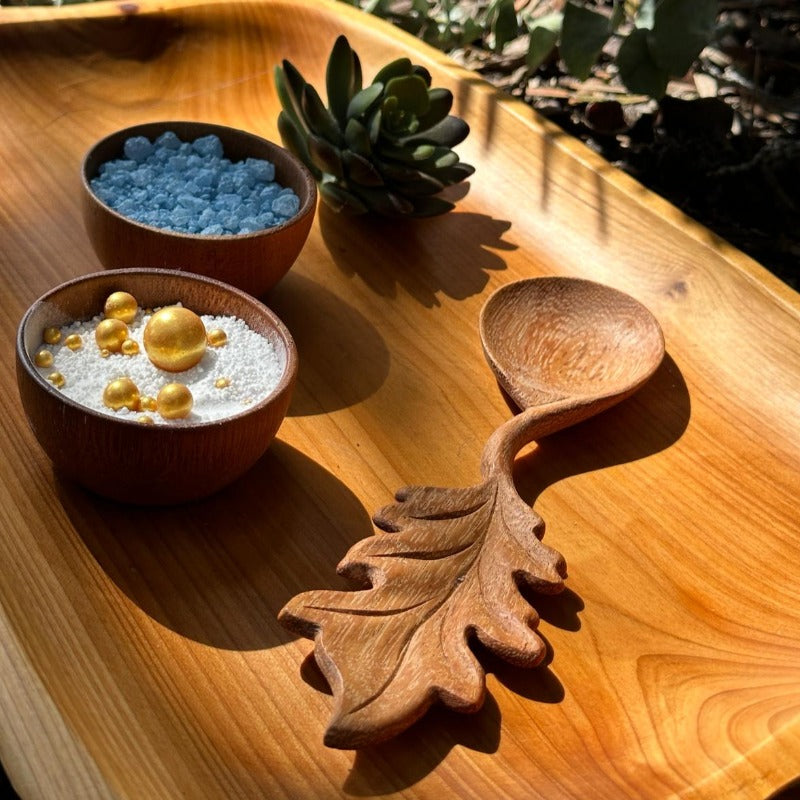 Handmade feather-shaped wooden spoon