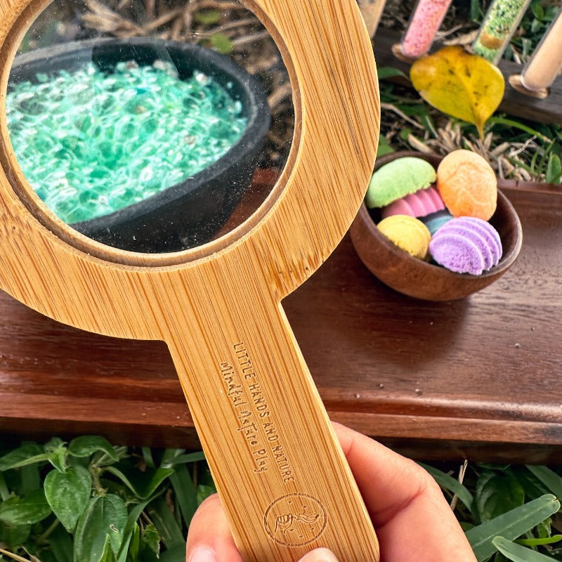 The true potion maker explorer will love getting a close up look with the wooden magnifying glass