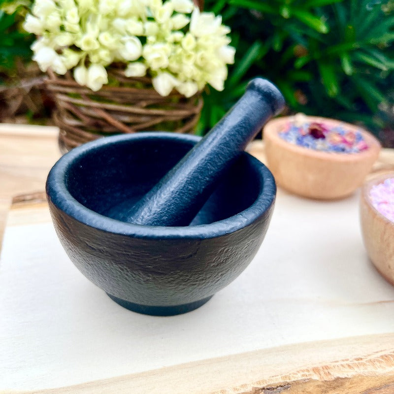 Iron mortar and pestle for mystical concoction adventure water and potion play with stylish black cast iron Mortar and Pestle set.